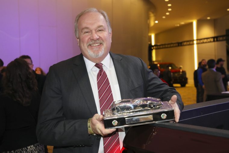 John Mendel, executive vice president of the Automobile Division of American Honda Motor Co., Inc., accepts the North American Truck of the Year award for the 2017 Honda Ridgeline on January 9, 2017 at the North American International Auto Show in Detroit.