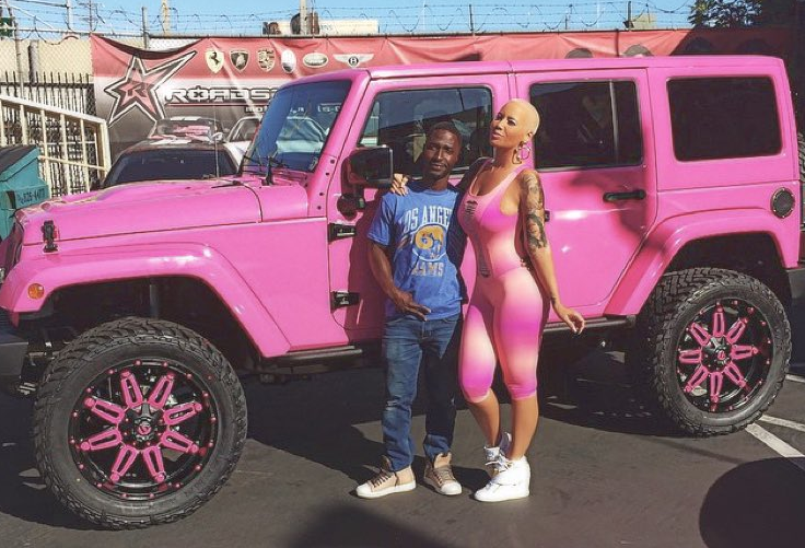 Would you have ever guessed that Amber Rose drives a bright pink Jeep