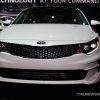 2017 Kia Optima white sedan car on display Chicago Auto Show