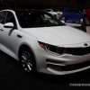 2017 Kia Optima white sedan car on display Chicago Auto Show