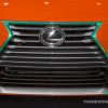 2017 Lexus IS Sriracha orange sedan car on display Chicago Auto Show