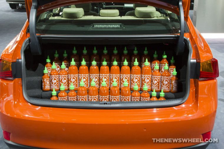 2017 Lexus IS Sriracha orange sedan car on display Chicago Auto Show