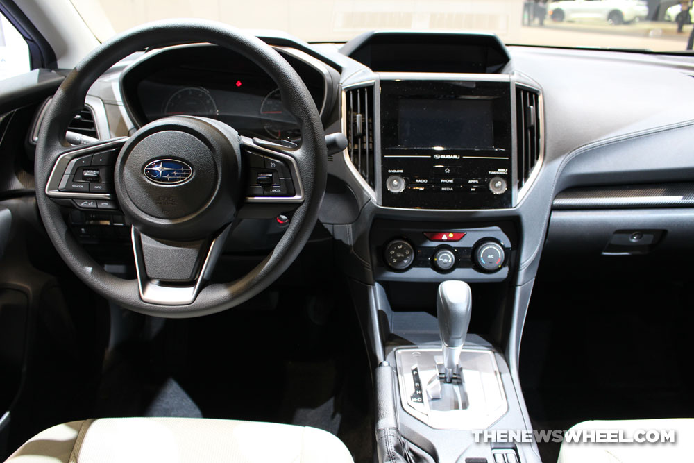 2017 Subaru Impreza 2.0i Premium blue hatchback car on display Chicago Auto Show