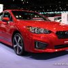 2017 Subaru Impreza 2.0i Sport red sedan car on display Chicago Auto Show