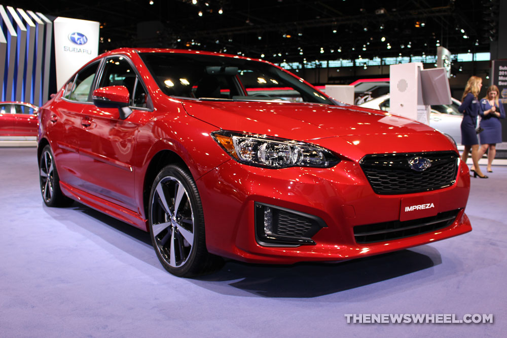 2017 Subaru Impreza 2.0i Sport red sedan car on display Chicago Auto Show