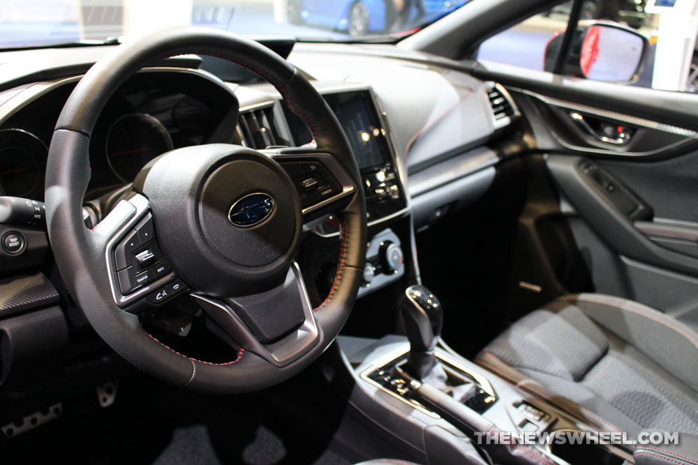 2017 Subaru Impreza 2.0i Sport red sedan car on display Chicago Auto Show