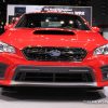 2017 Subaru WRX red sedan car on display Chicago Auto Show