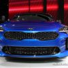 2018 Kia Stinger blue sedan car on display Chicago Auto Show