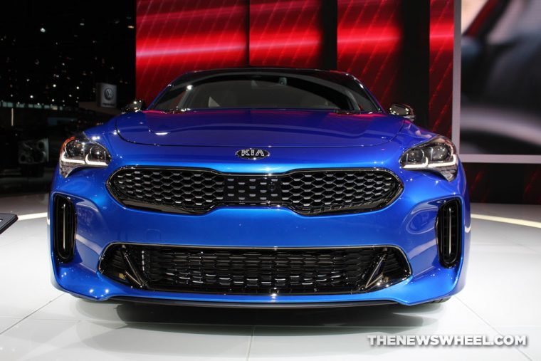 2018 Kia Stinger blue sedan car on display Chicago Auto Show