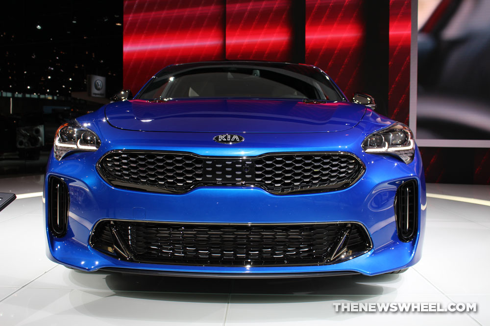 2018 Kia Stinger blue sedan car on display Chicago Auto Show