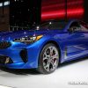 2018 Kia Stinger blue sedan car on display Chicago Auto Show