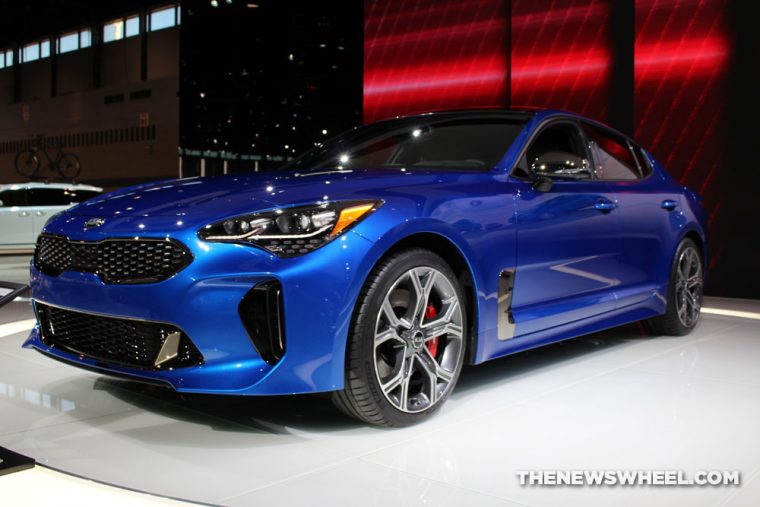 2018 Kia Stinger blue sedan car on display Chicago Auto Show