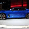 2018 Kia Stinger blue sedan car on display Chicago Auto Show