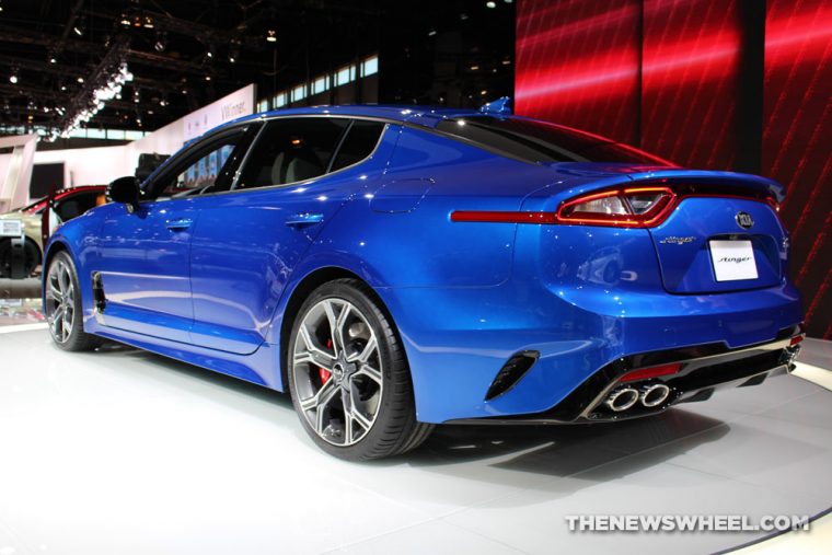 2018 Kia Stinger blue sedan car on display Chicago Auto Show