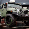 Celebrity model Amber Rose’s Jeep Wrangler has gone from bubble gum pink to chrome pink to army green