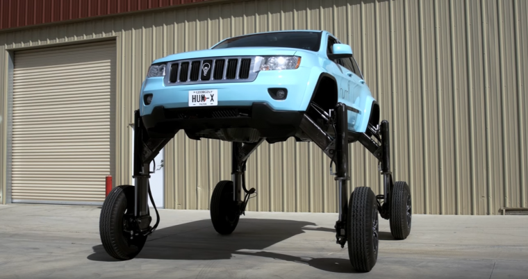 Hydraulic-Powered Hum Rider Jeep Grand Cherokee Travels Over ...