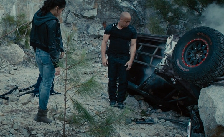 Toretto looks at his crashed car