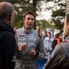 Travis_Pastrana_speaks_with_team_manaber_John_Buffum_and_codriver_Robbie_Durant