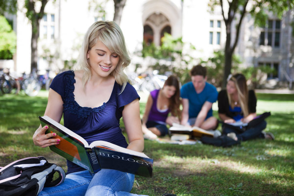 student studying books