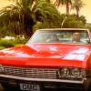 OMC How Bizarre 1968 Red Chevrolet Impala Convertible