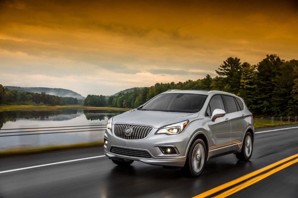 The 2018 Buick Envision on the road at sunset