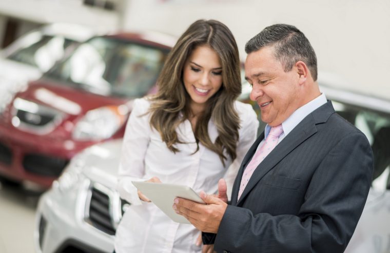 Man and Woman Car Dealership