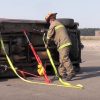 firefighters stabilize vehicle