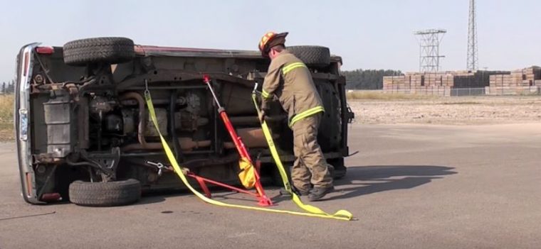 firefighters stabilize vehicle