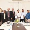 Ford executives with Navin Mittal, Secretary MA&UD and T Chiranjeevulu Commissioner HMDA during the MoU signing