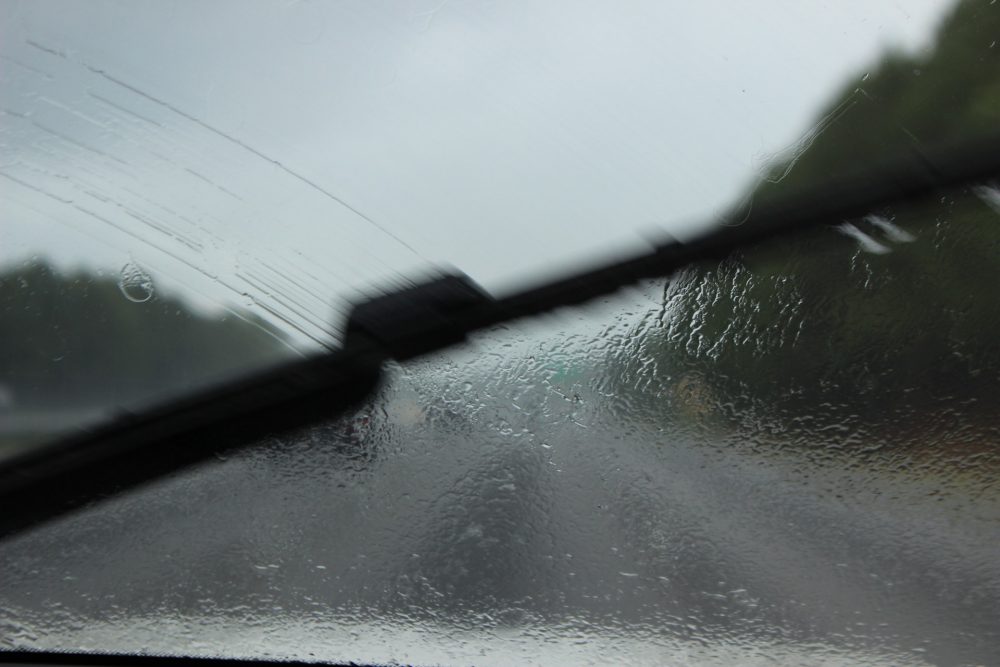 Windshield Wipers wiping rain off a window