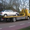 Tow truck with car