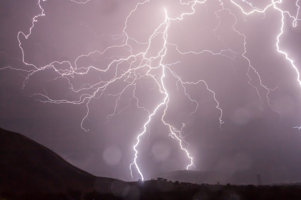 Bolt of Lightning in gray sky