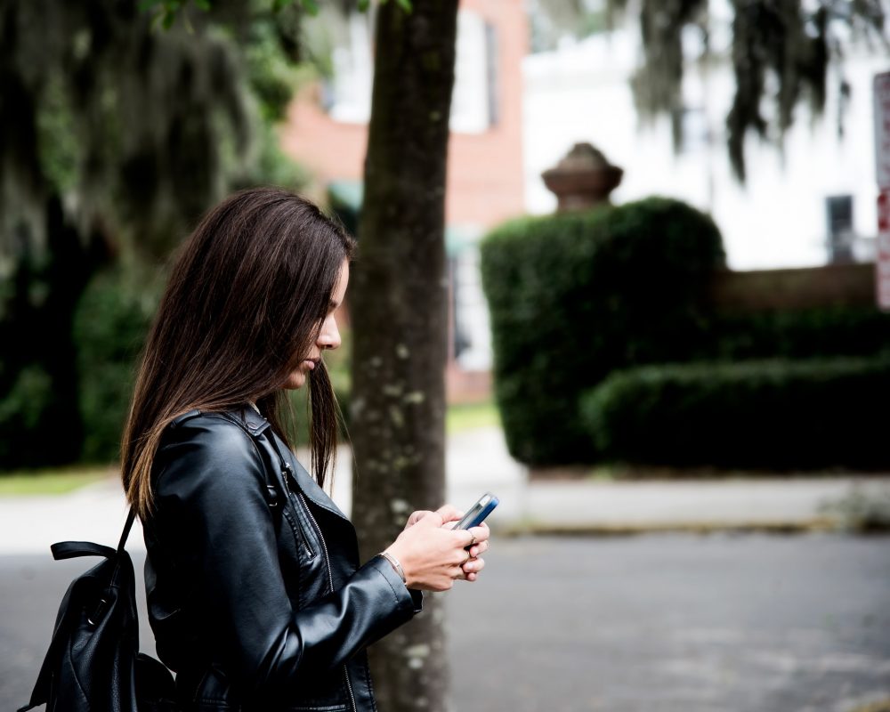 Girl texting on cell phone