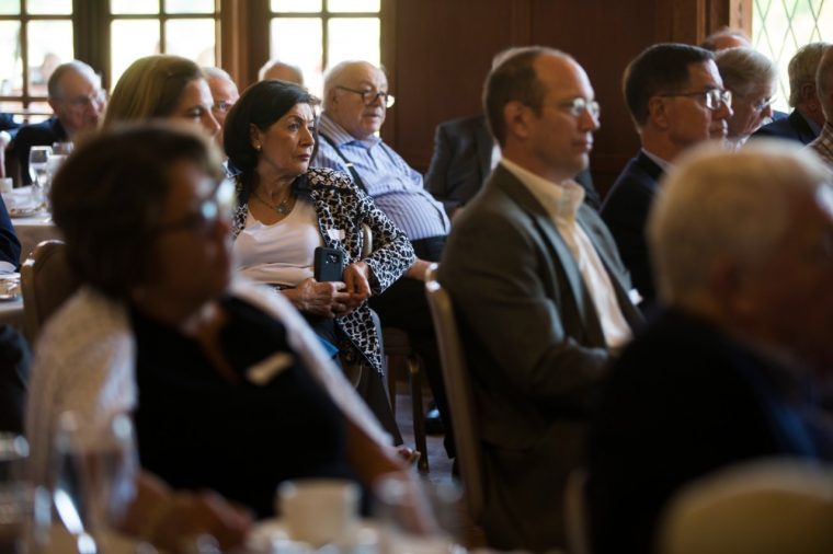 Retirees attend a Q&A with Jim Farley at Dearborn Country Club