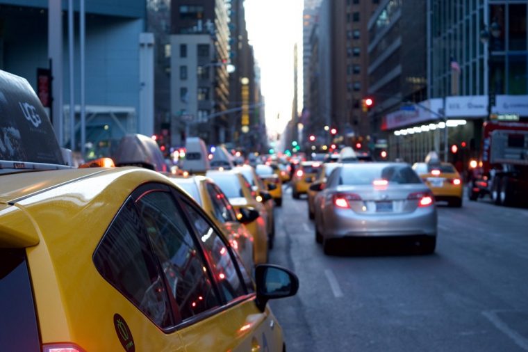 taxi-in-big-city-delivery-vehicle