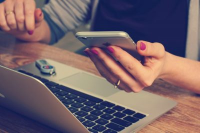 woman-using-computer-phone-online-shopping