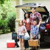 Family getting ready to go on a road trip