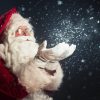 santa blowing snow from his hand