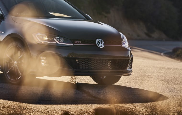 2019 Volkswagen GTI Rabbit Edition driving on a dusty trail