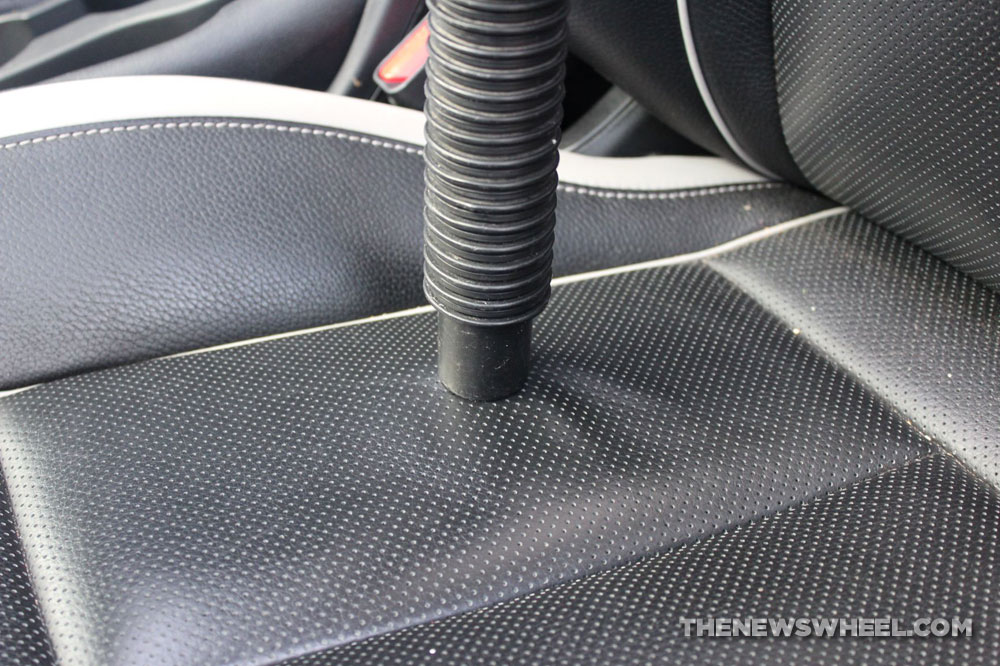 Remove pressure dent from leather car seat vinyl indentation fix DIY flatten vacuum