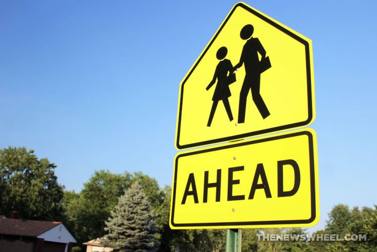 School crossing pedestrian crossing yellow street sign traffic safety standardized names