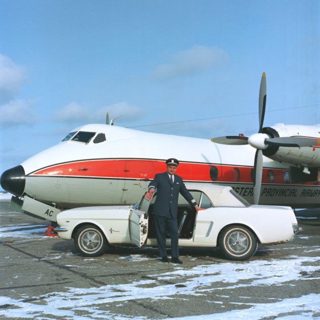 Capt. Stanley Tucker with 1965 Ford Mustang serial number 1