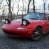 Red Mazda Miata convertible