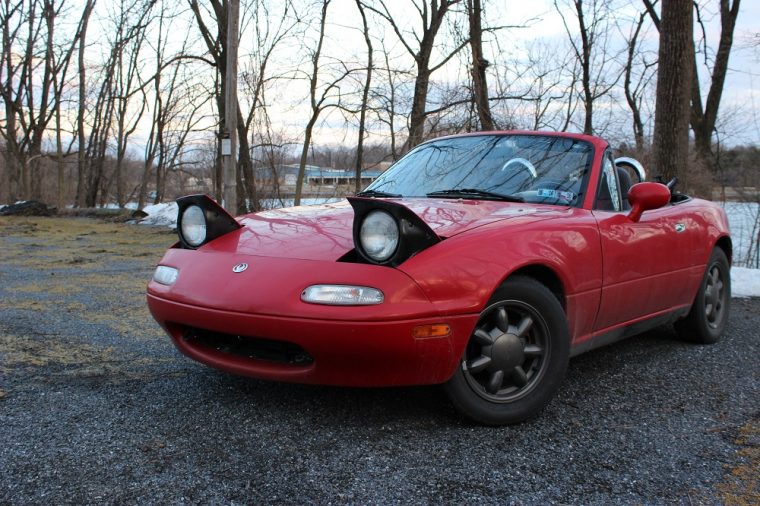 Red Mazda Miata convertible