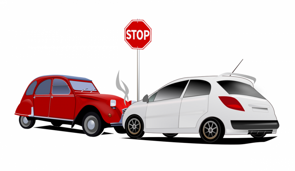 A graphic showing two cars colliding at a stop sign