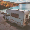 Man leaning on white RV