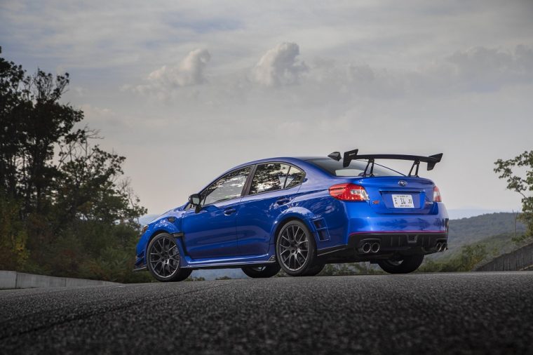 A Blue Subaru STI S209