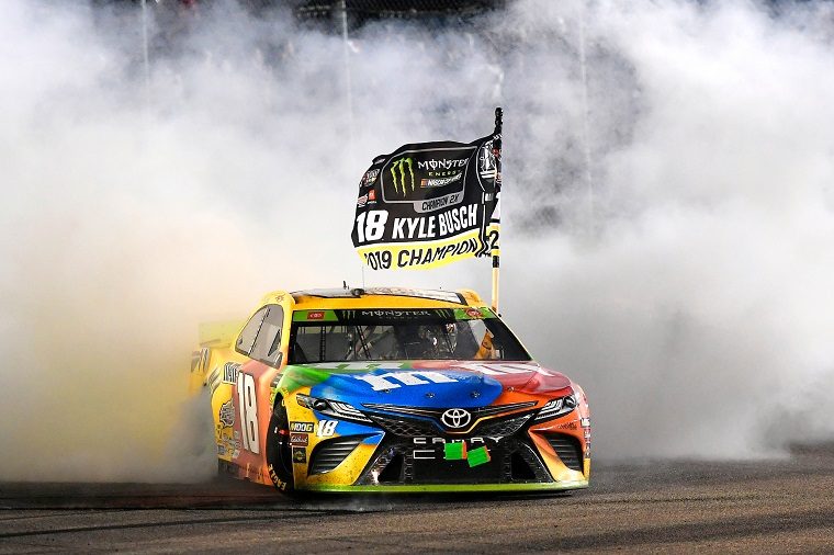 Kyle Busch celebrates with a burnout