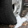 Snow on tires cold temperatures winter freeze chill melting ice wheels