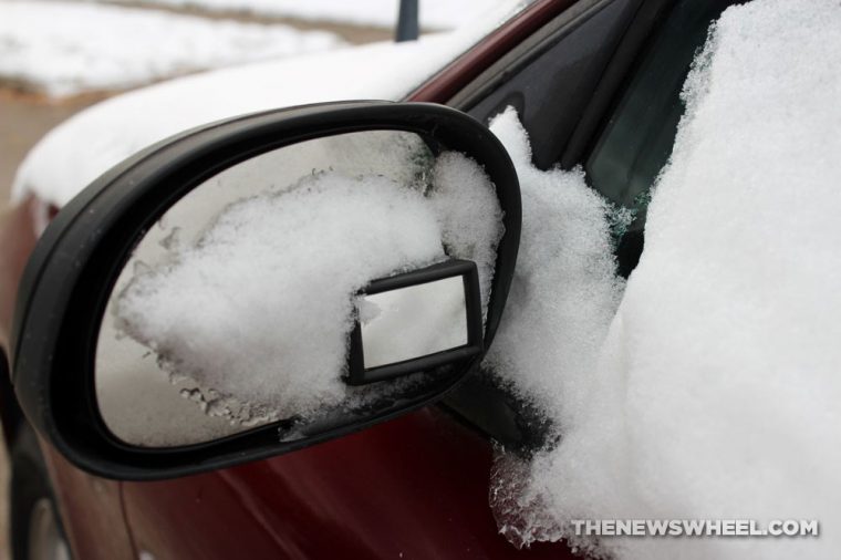 Snow side-view mirror winter weather visibility car driving tips